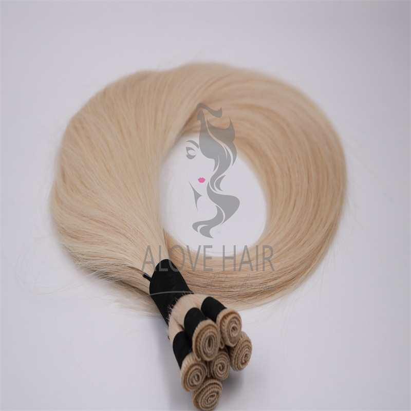 Thin knot blonde color hand tied weft extensions for extensiontraining