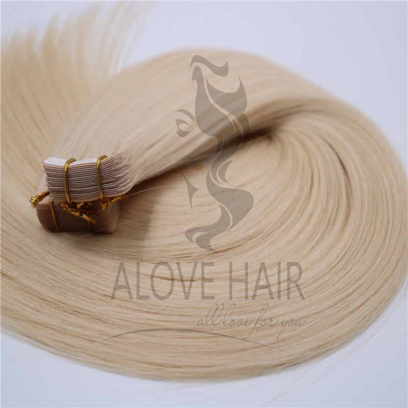 Wholesale blonde tape in human hair extensions 