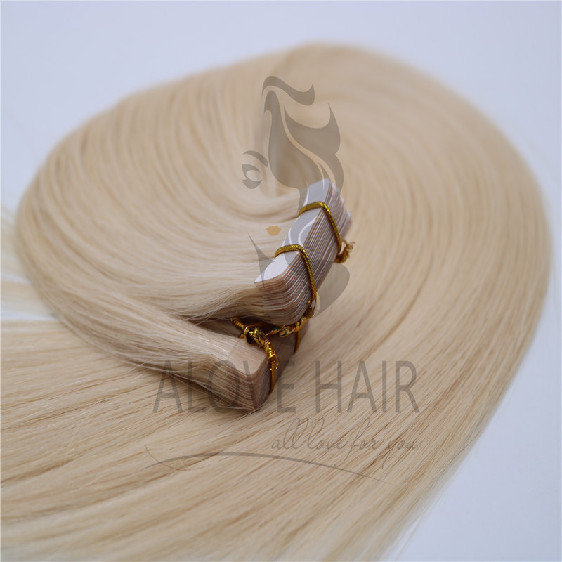 Wholesale blonde tape in human hair extensions 