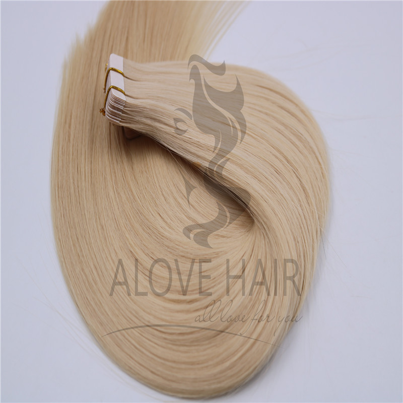 Wholesale blonde tape in human hair extensions 