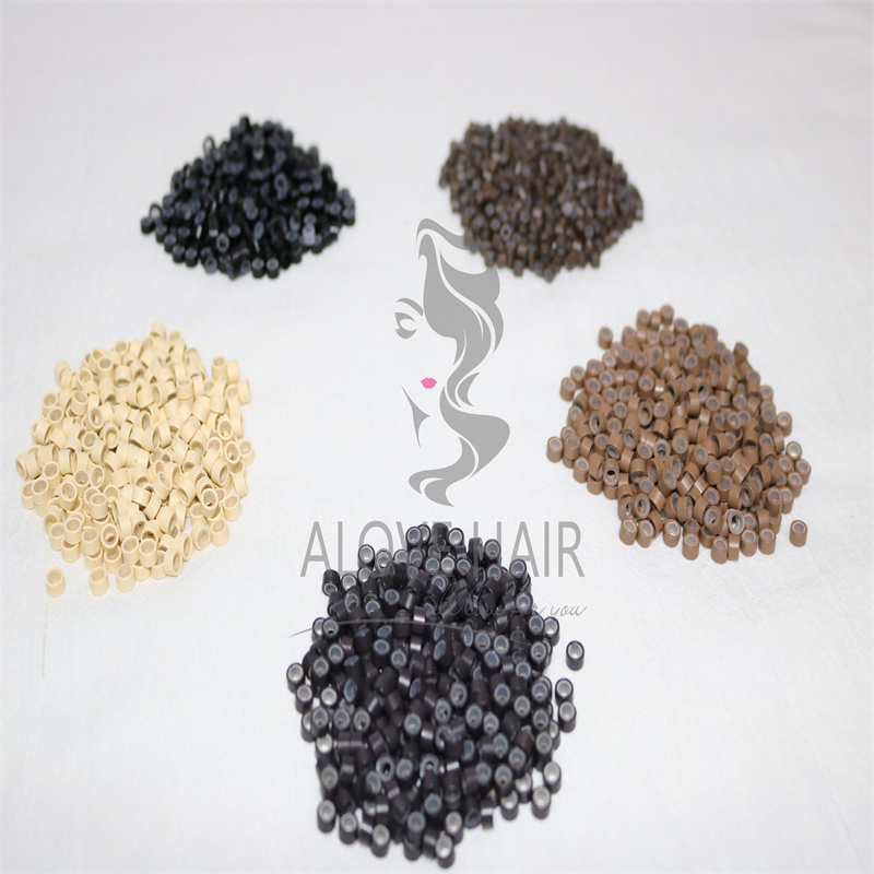 Different color silicone Micro Beads are used for hand tied extensions