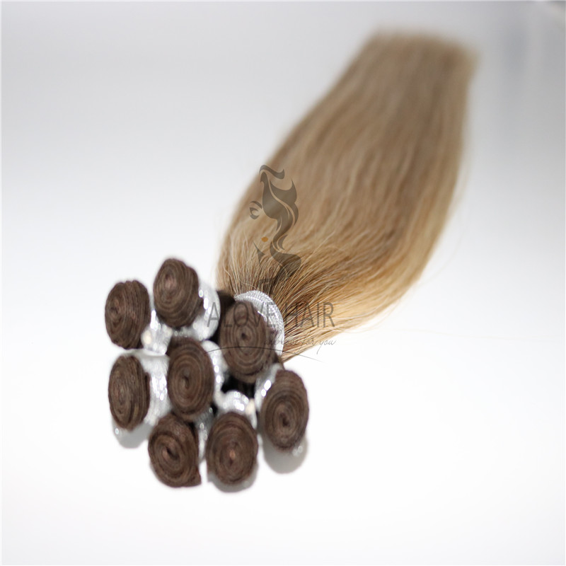 China hand sewn weft hair extensions manufacturer 