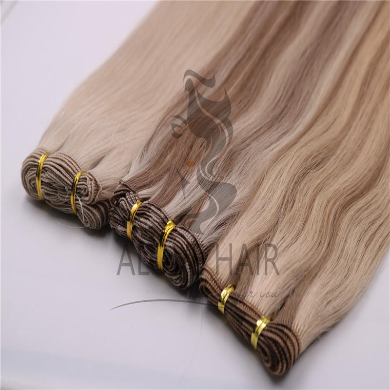 Full-cuticle-hand-tied-extensions-Houston.jpg