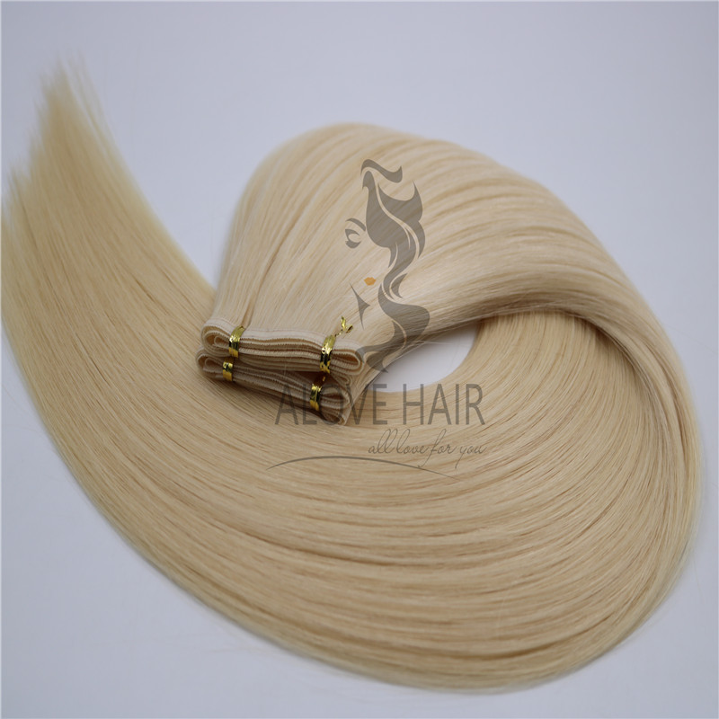 Wholesale-high-quality-cuticle-intact-remy-flat-weft-hair-extensions.jpg