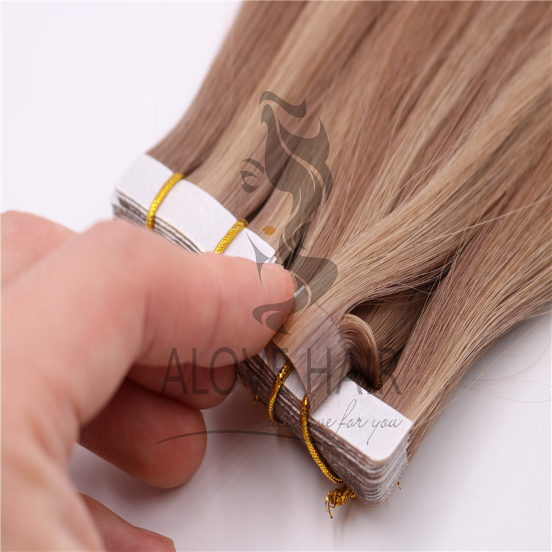 wholesale-best-quality-tape-in-hair-extensions.jpg