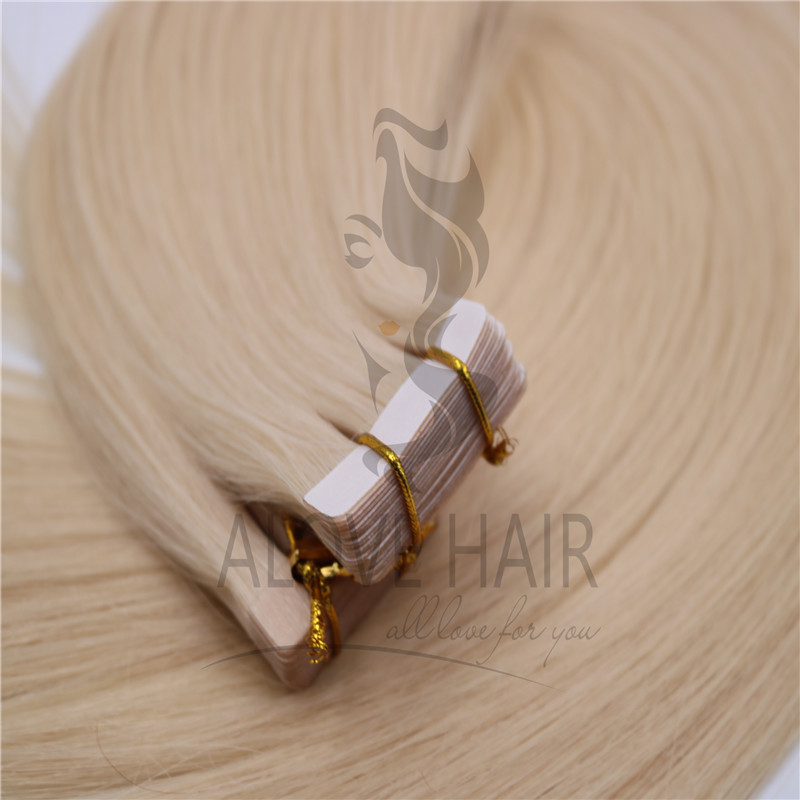 Wholesale blonde tape in human hair extensions 