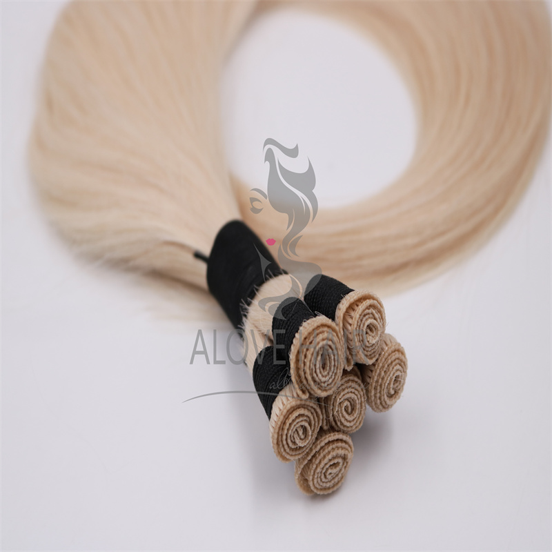 Thin knot blonde color hand tied weft extensions for extensiontraining